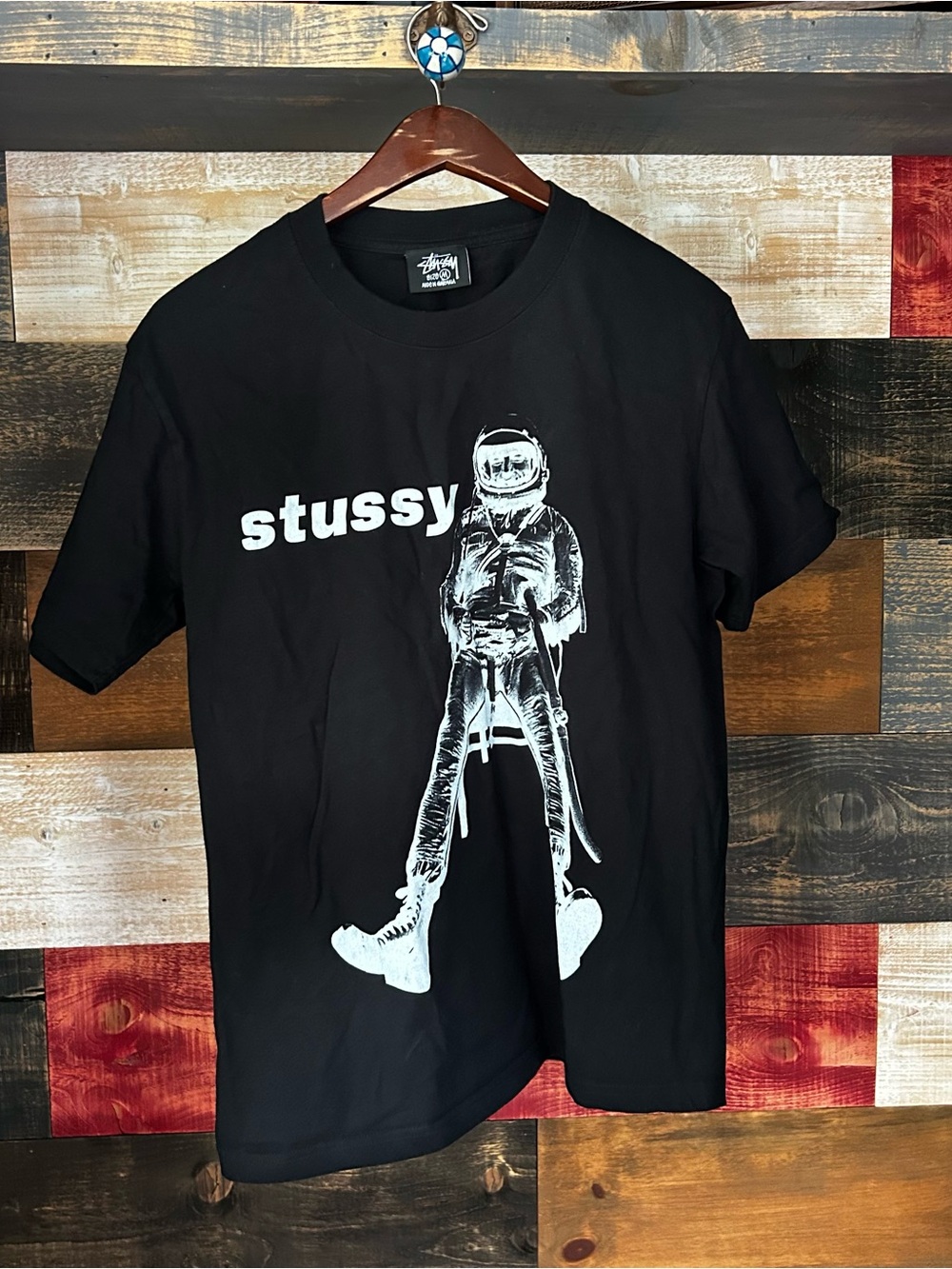 Stussy Black Tee with White Astronaut Graphic medium
